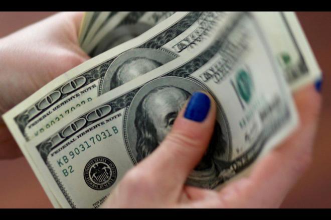 Dólar cai para R$ 5,07 com otimismo em relação a vacinas